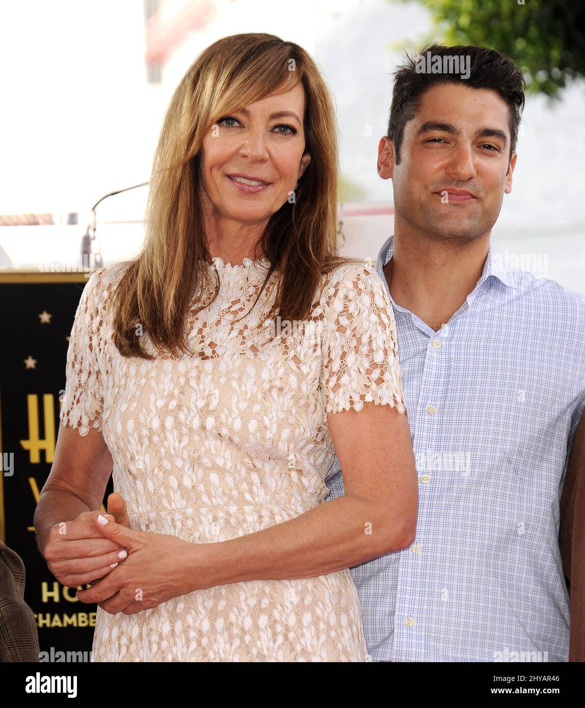 Allison Janney, Philip Joncas attending Alison Janney's Hollywood star walk of fame ceremony in Los Angeles, California. Stock Photo