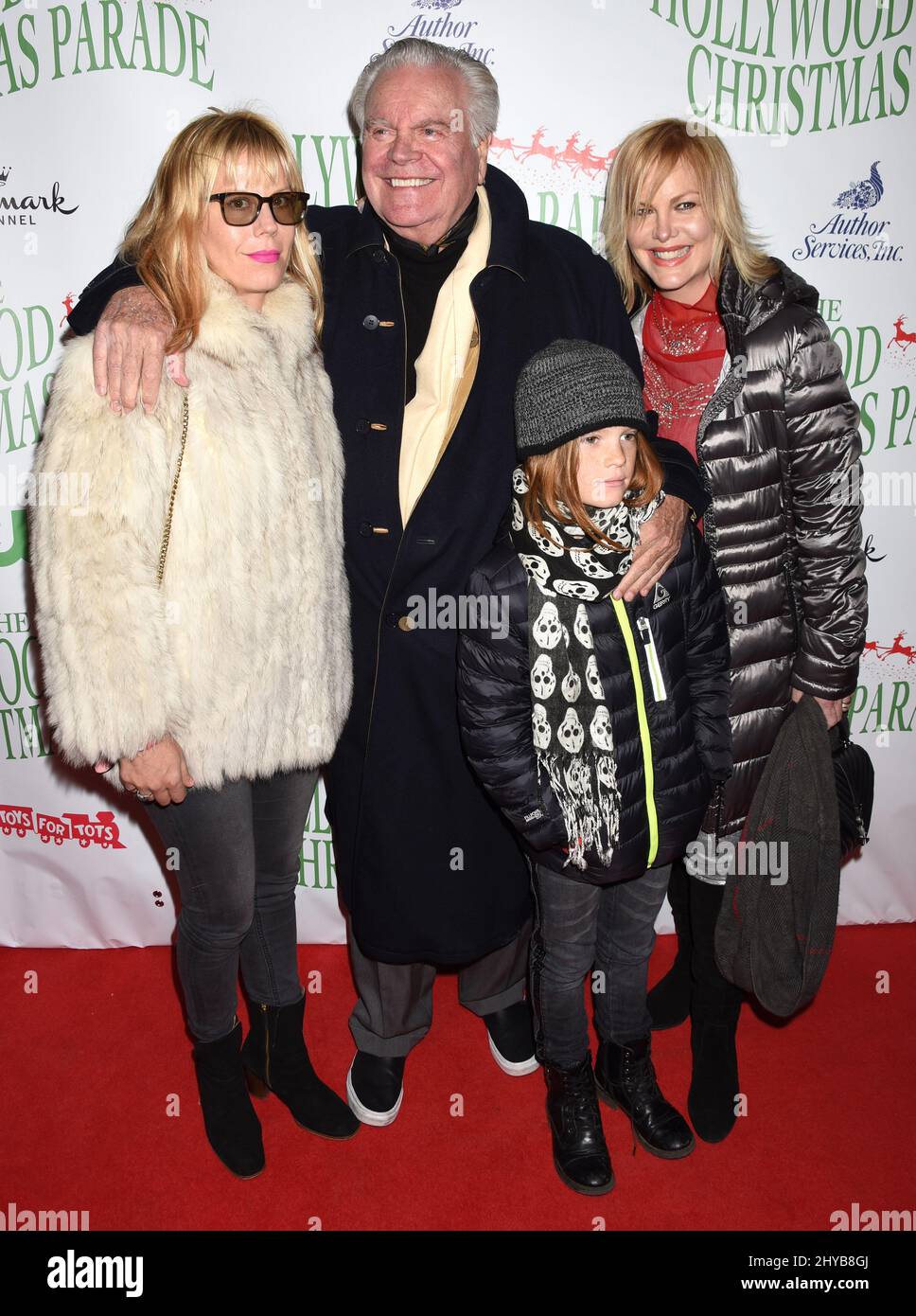 Courtney Wagner, Robert Wagner, Katie Wagner and Riley Lewis attends the 85th Annual Hollywood Christmas Parade held on Hollywood Blvd. Stock Photo