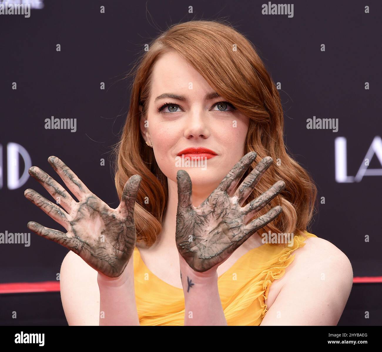 Emma Stone at her hand and footprint ceremony in Hollywood Stock Photo ...