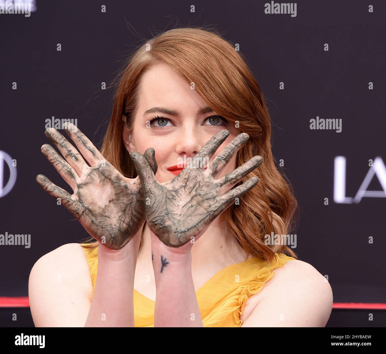 Emma Stone at her hand and footprint ceremony in Hollywood Stock Photo ...