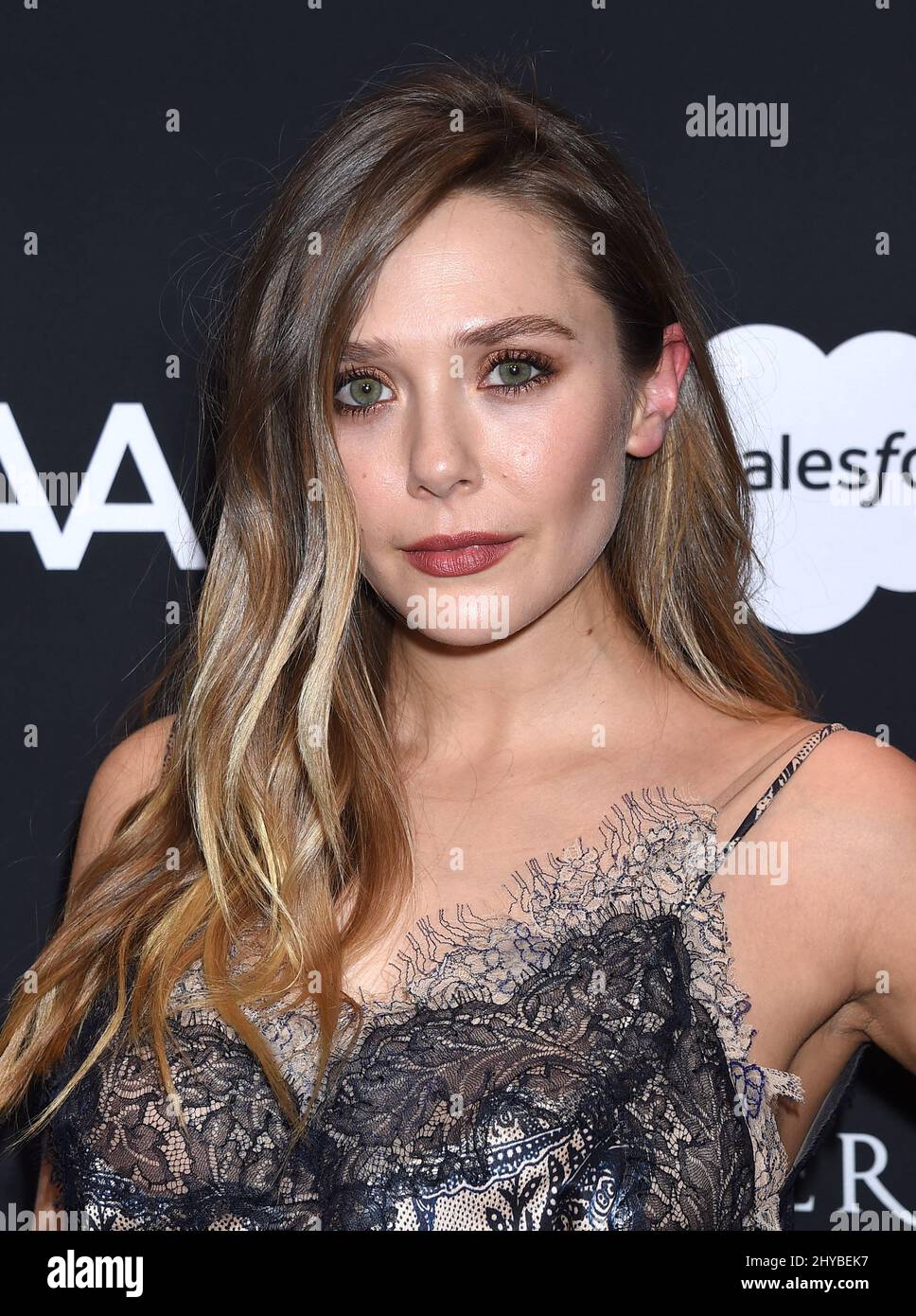 Elizabeth Olsen attends The Sean Penn & Friends 'Haiti Rising