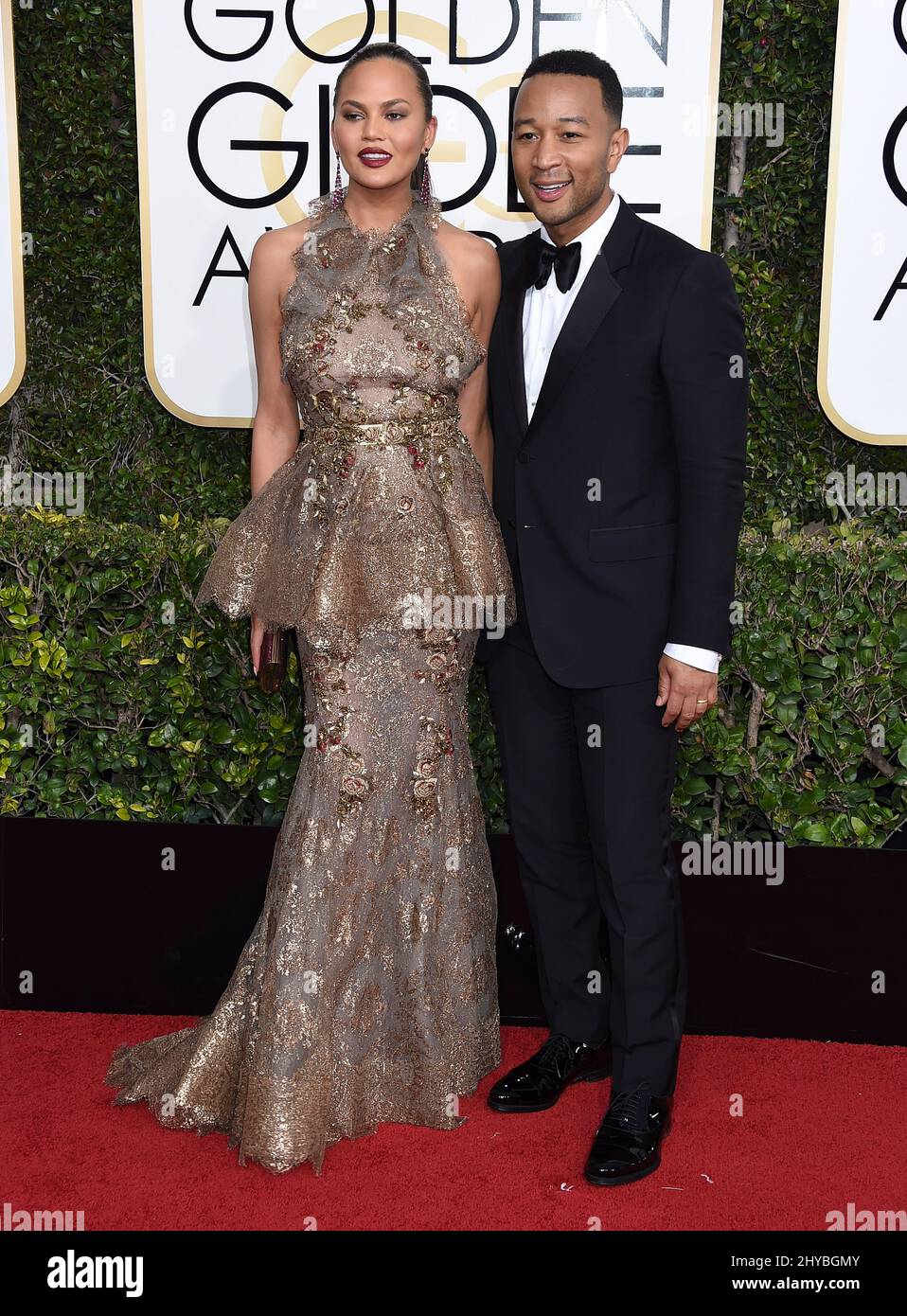 Chrissy Teigen and John Legend attending the 74th Annual Golden Globe