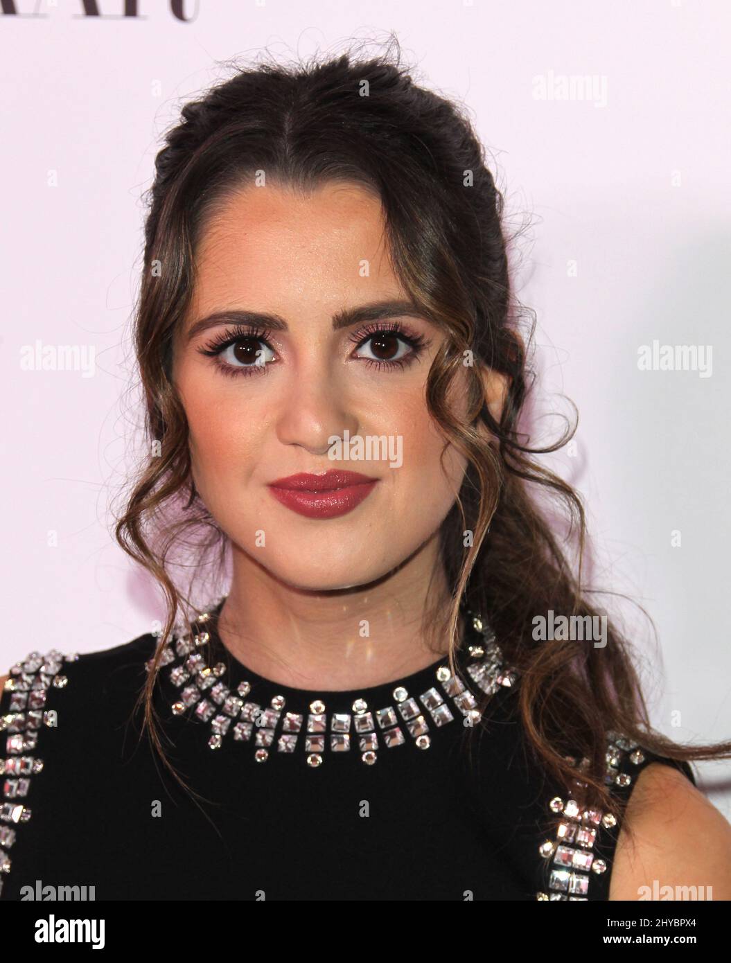 Laura Marano attending Harper's Bazaar Celebrating 150 Most Fashionable