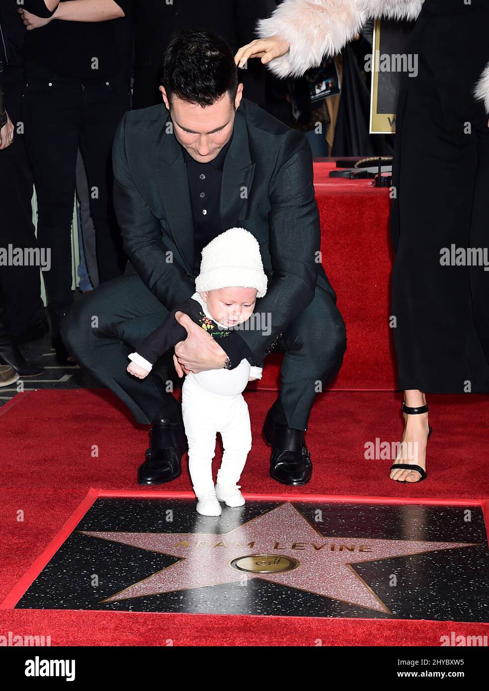 Adam Levine and Dusty Rose Levine attending Adam Levine's Hollywood Walk of Fame Ceremony Stock Photo