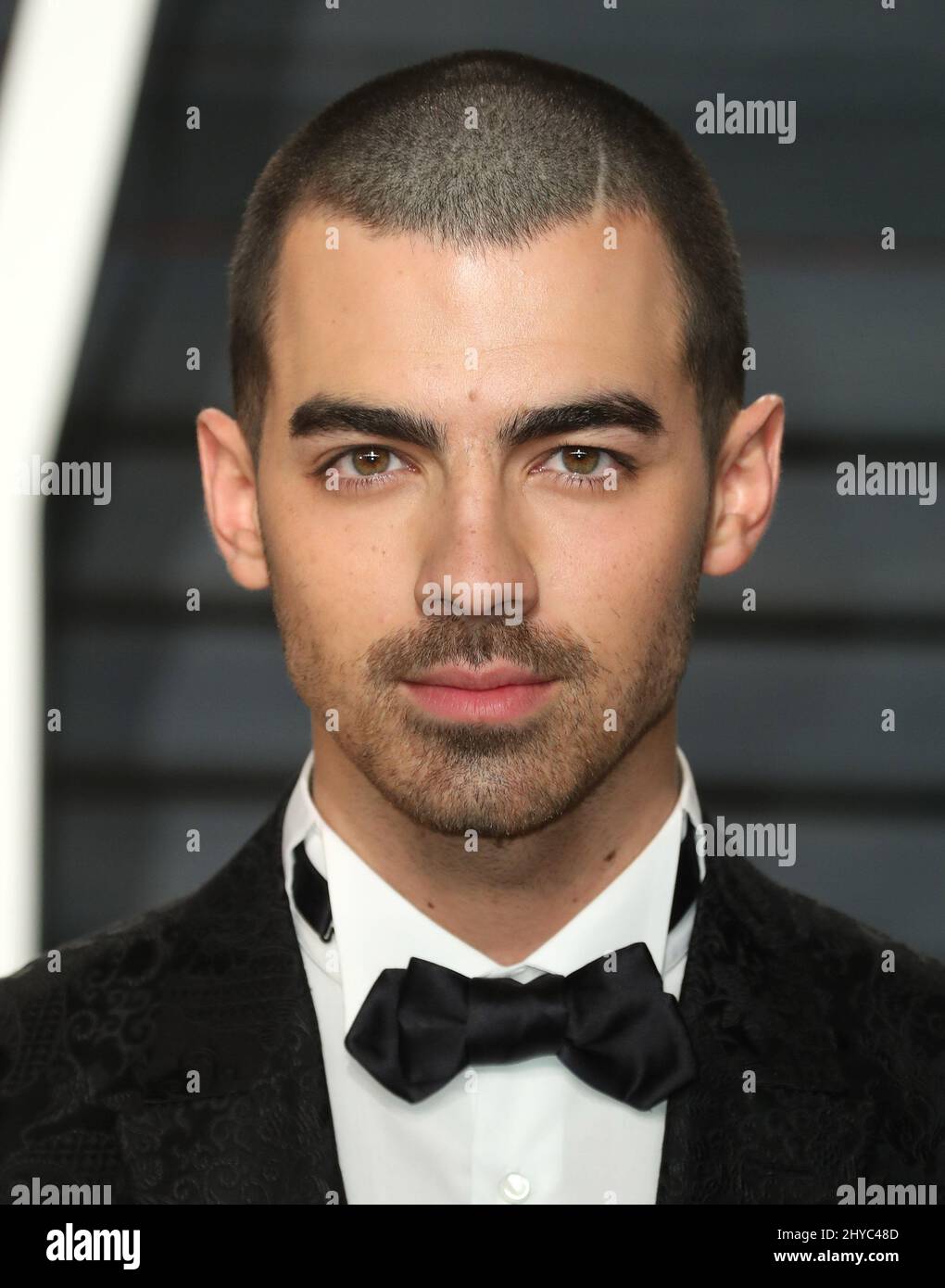 Joe Jonas at 2017 Vanity Fair Oscar Party hosted by Graydon Carter at