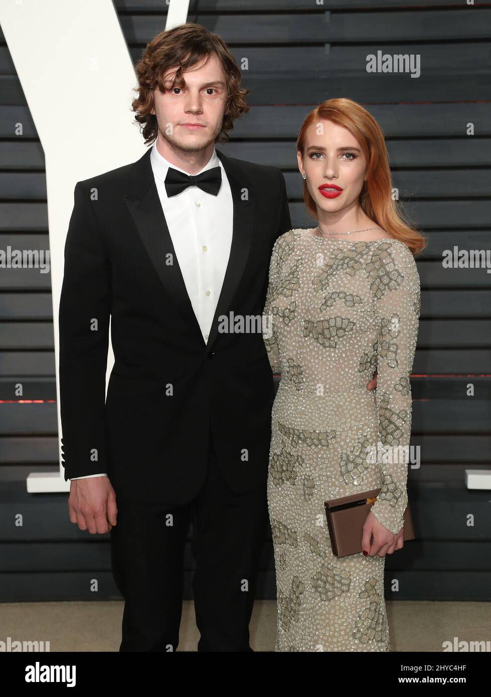 Evan Peters, Emma Roberts arriving at the Vanity Fair Oscar Party in