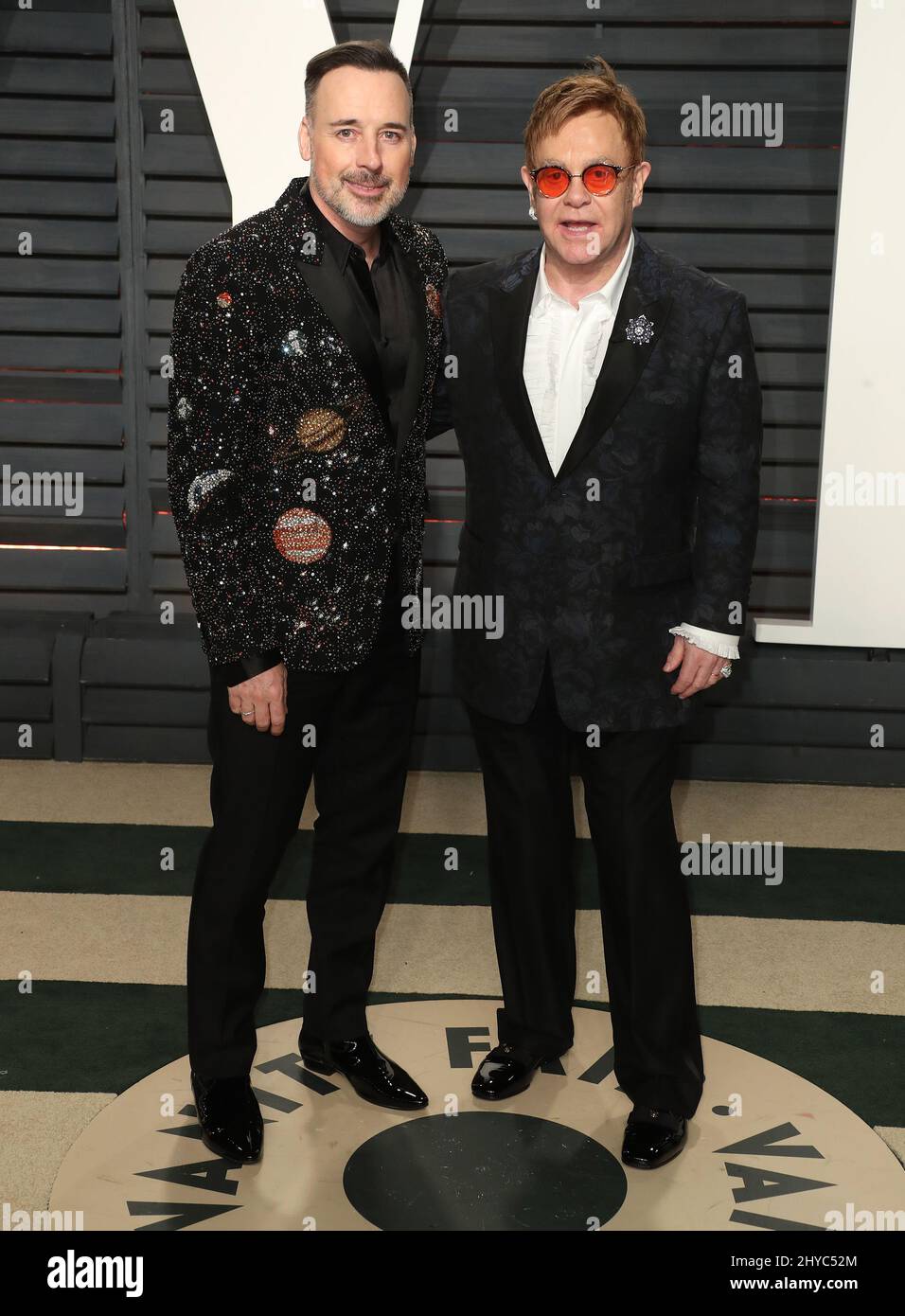 David furnish arriving vanity fair oscar party hi-res stock photography