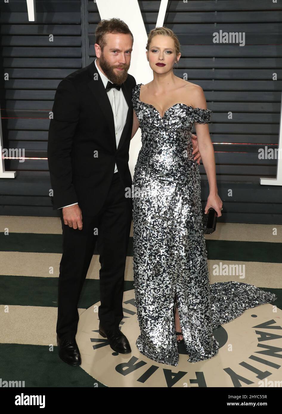 Teresa Palmer, Mark Webber arriving at the Vanity Fair Oscar Party in ...