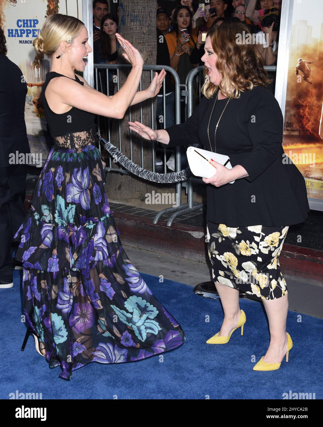 Kristen Bell and Melissa McCarthy arriving at 'Chips' Premiere held at the  TCL Chinese Theatre Stock Photo - Alamy