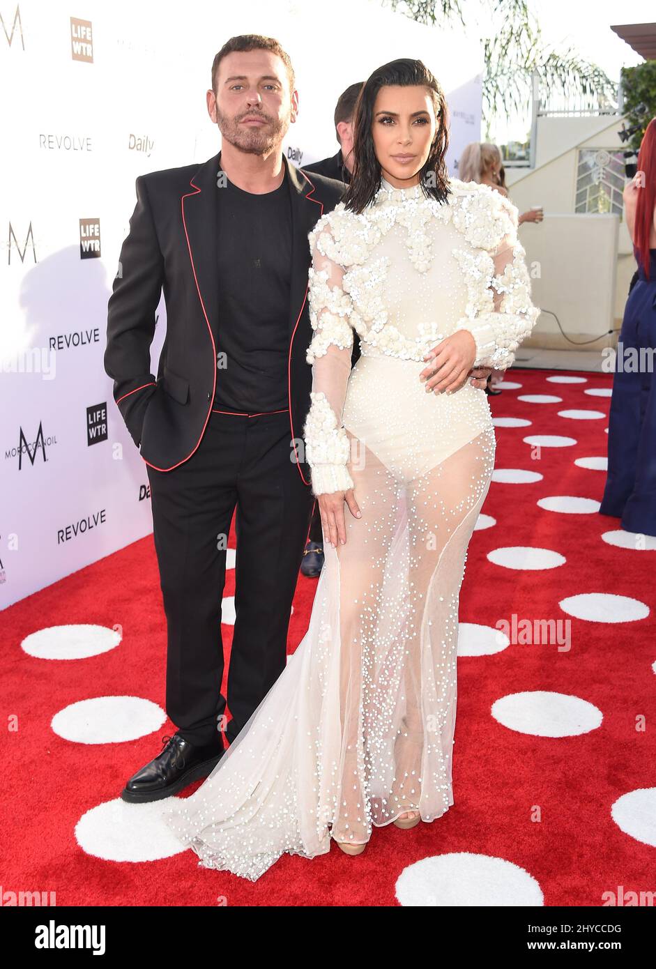 Mert Alas and Kim Kardashian arriving at the Daily Front