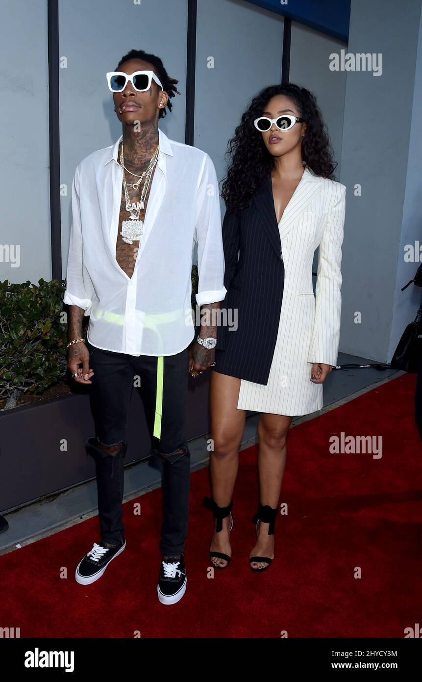 Wiz Khalifa and Izabela Guedes attending the 