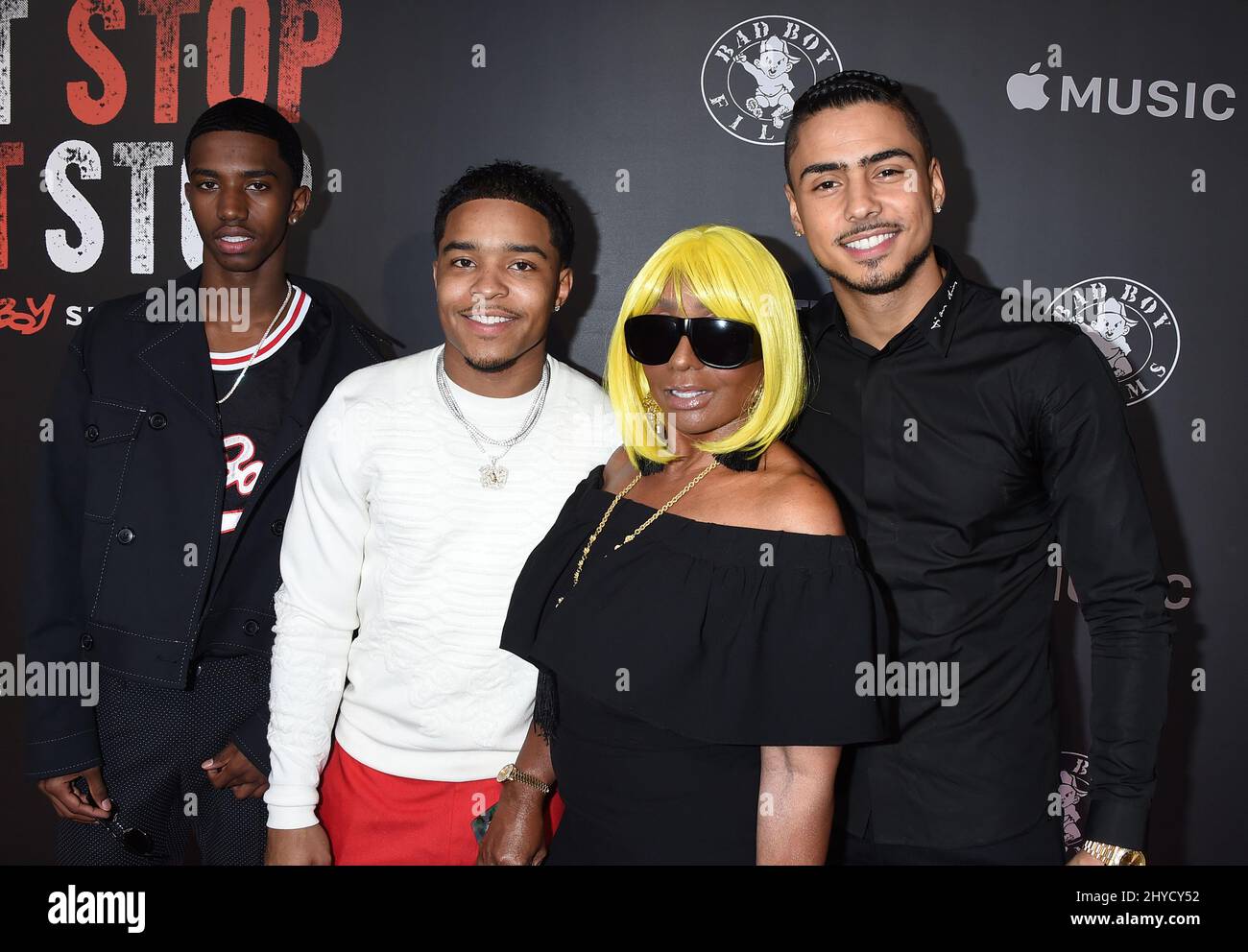 Quincy Brown, Christian Combs, Janice Combs and Justin Combs attending