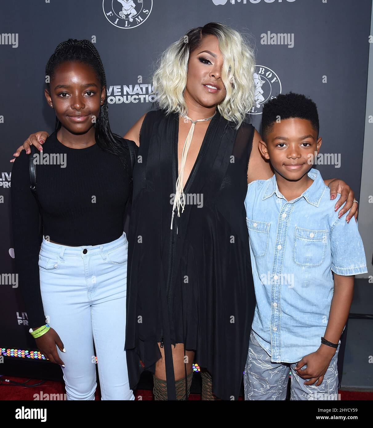 K'mari Mae Epps, Keisha Spivey Epps and Amir Epps attending the 'Can't Stop, Won't Stop: A Bad Boy Story' premiere held at the Writers Guild of America in Los Angeles, USA Stock Photo