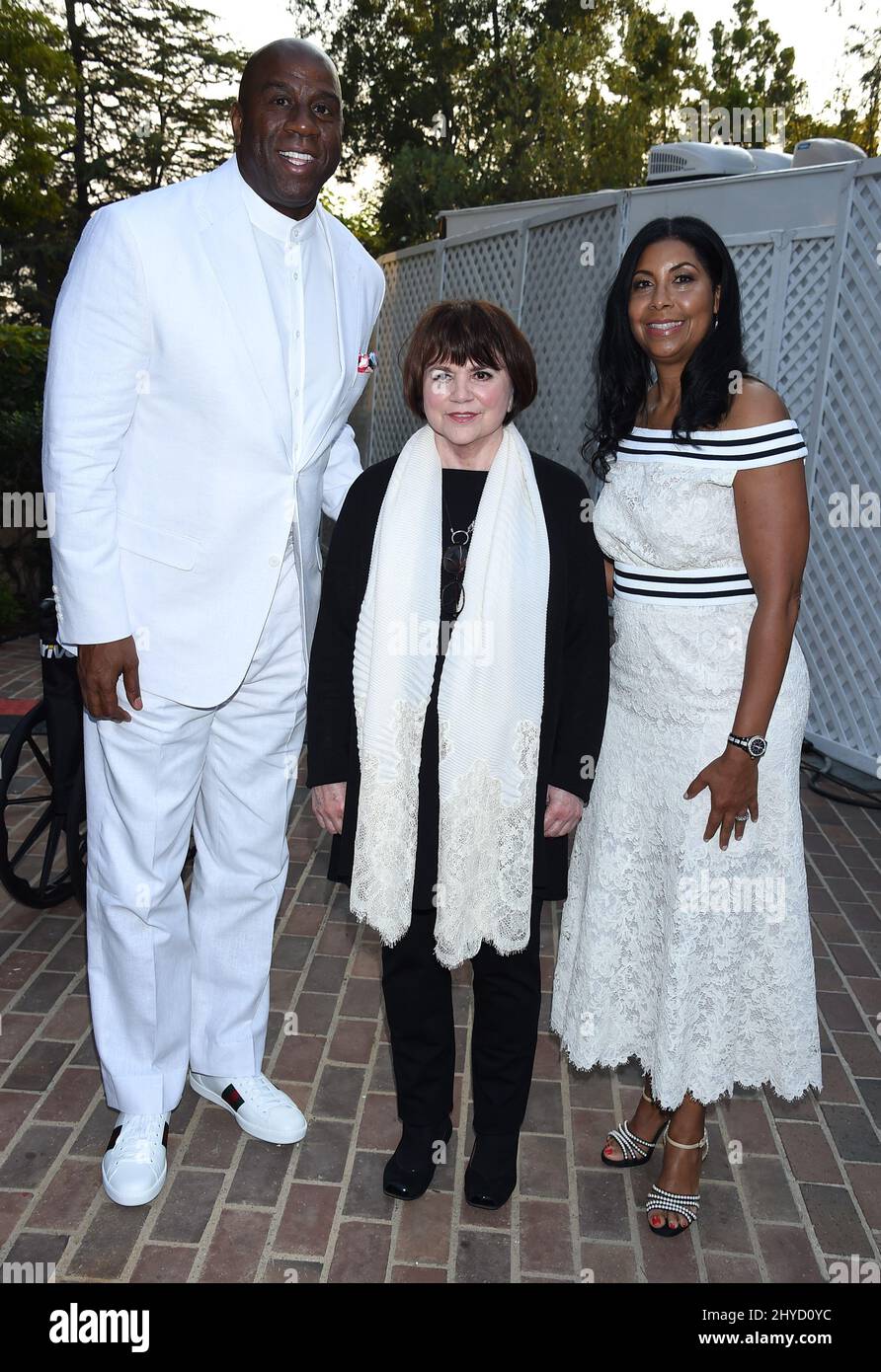 Earvin Johnson Jr., Linda Ronstadt and Cookie Johnson attending the