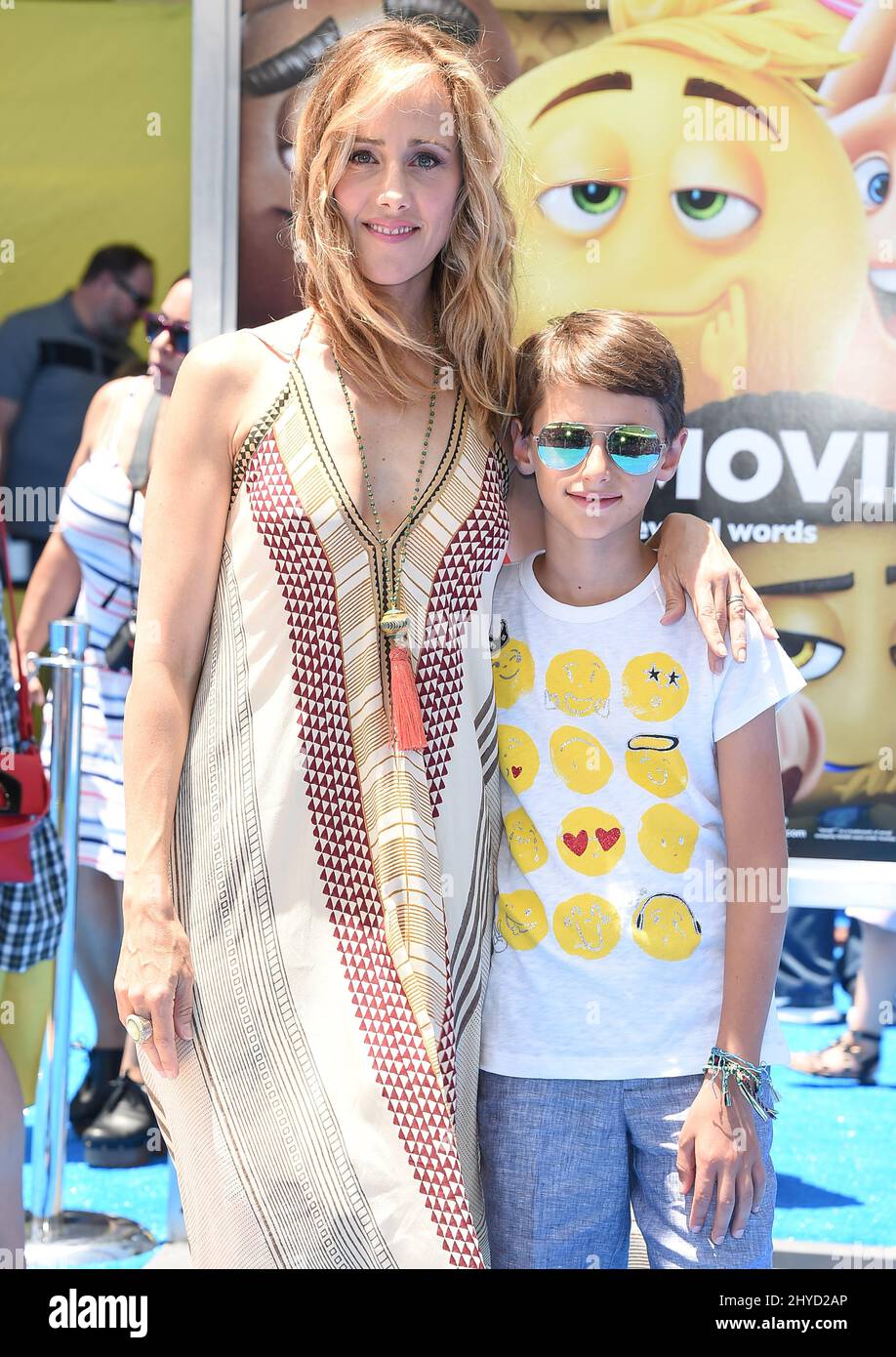 Leo The Raver Kim Raver and Leo Kipling Boyer attending The Emoji Movie World ...