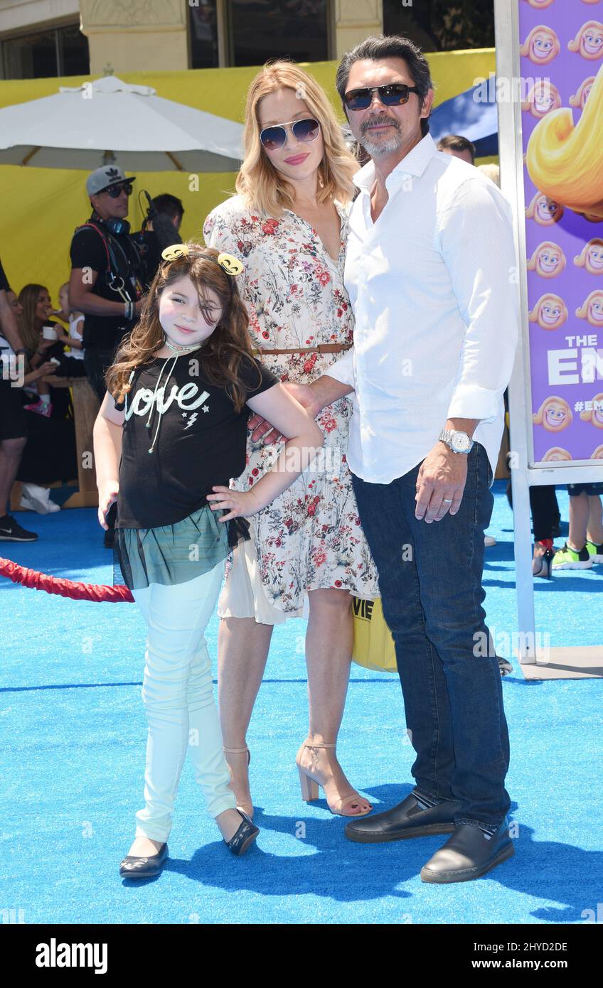 Lou Diamond Phillips, Yvonne Boismier Phillips and Indigo Phillips attending The Emoji Movie World Premiere held at the Regency Village Theatre Stock Photo