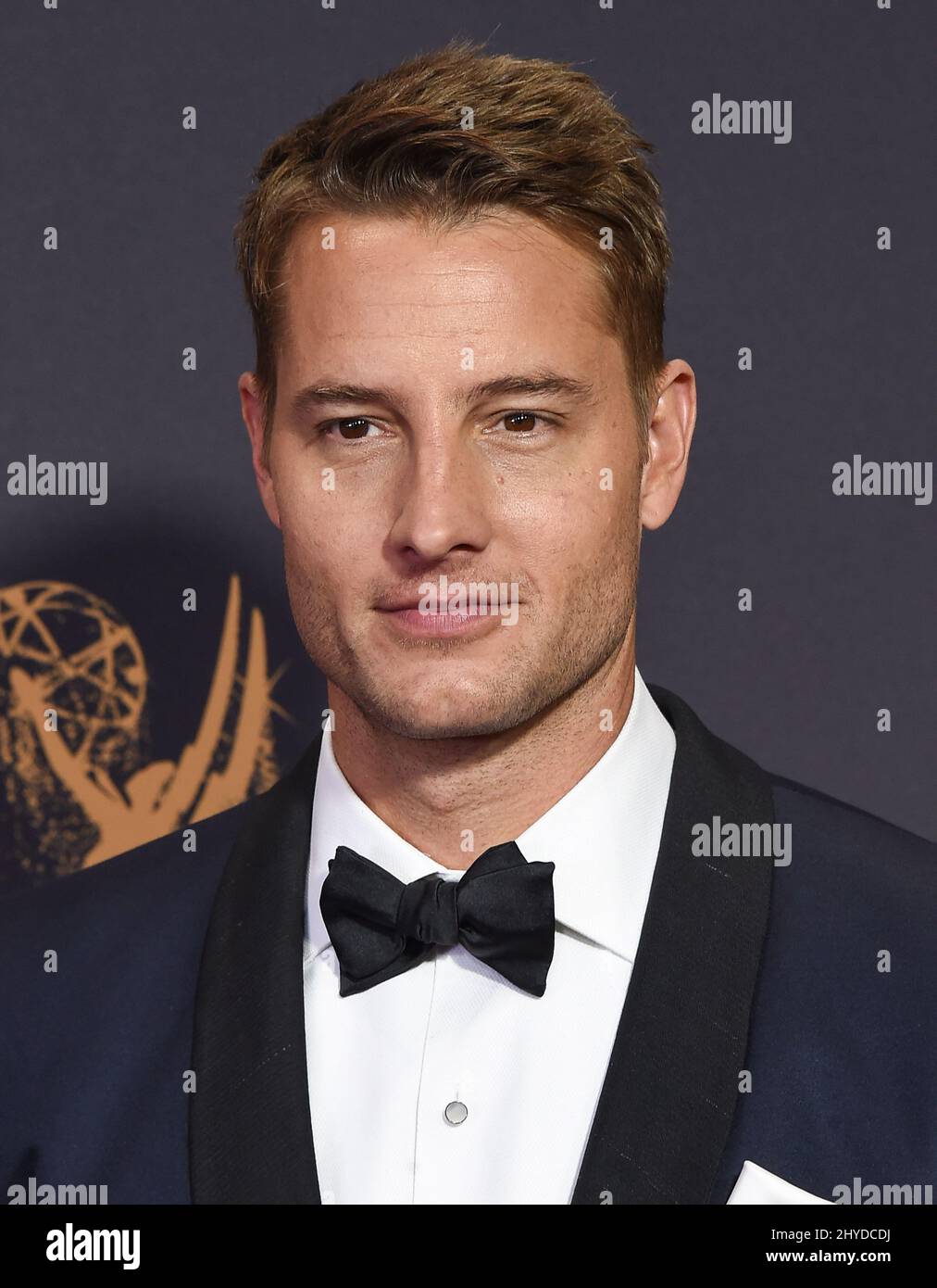 Justin Hartley arriving at the 69th Emmy Awards held at the Microsoft
