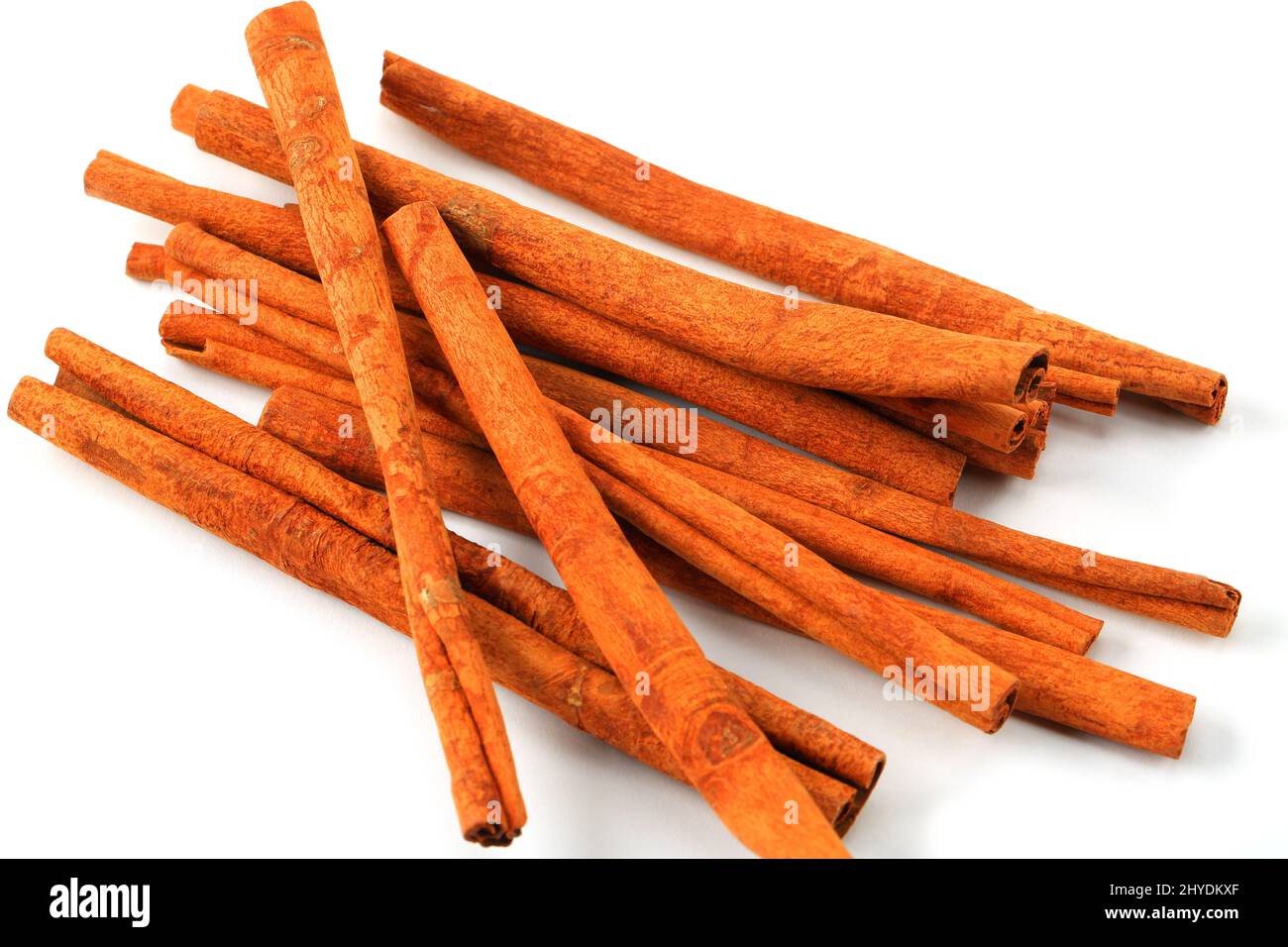 Cinnamon sticks on white background Stock Photo Alamy