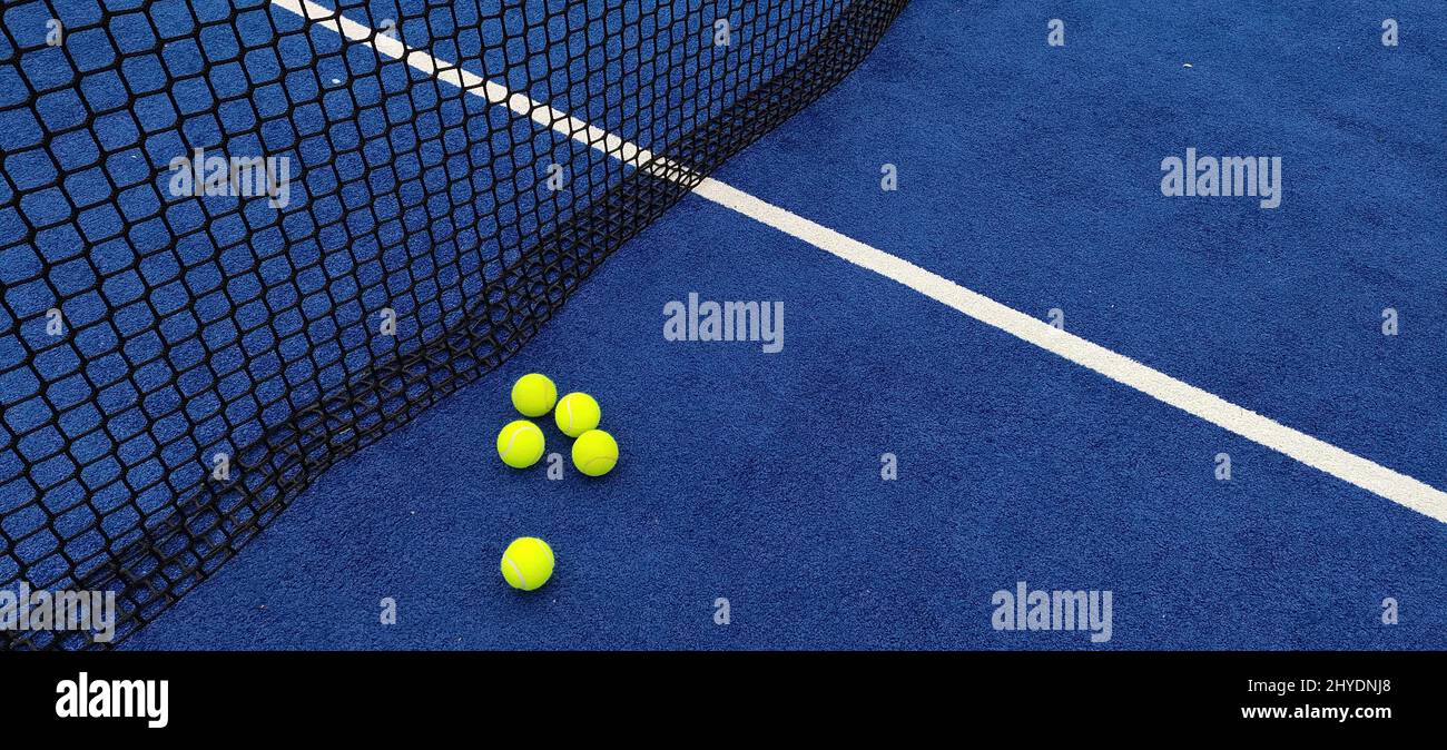 Photo of tennis balls in a tennis court Stock Photo Alamy