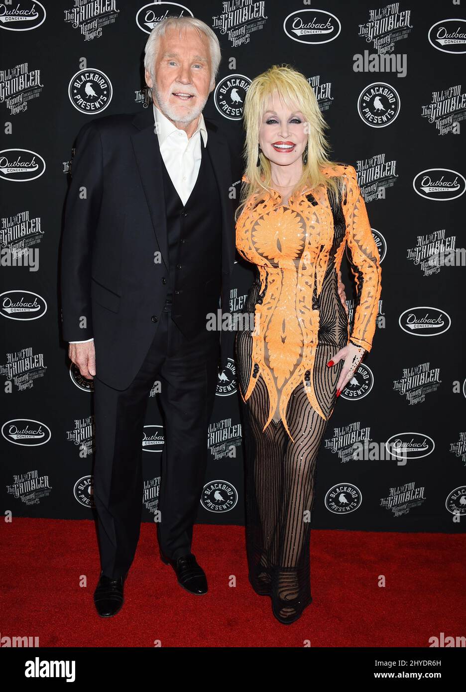 Kenny Rogers and Dolly Parton attending the Kenny Rogers 'All In For