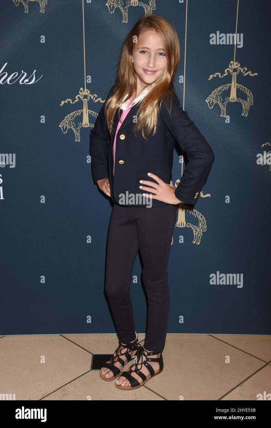 Ava Kolker attending the Brooks Brothers and St. Jude Annual Holiday