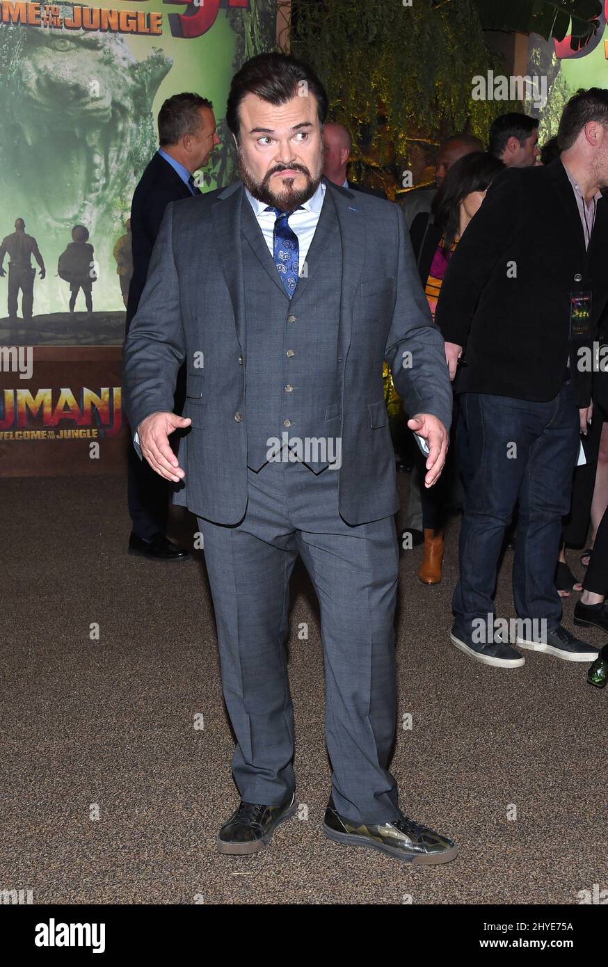 The suit jacket plaid tweed worn by Jack Black in Jumanji