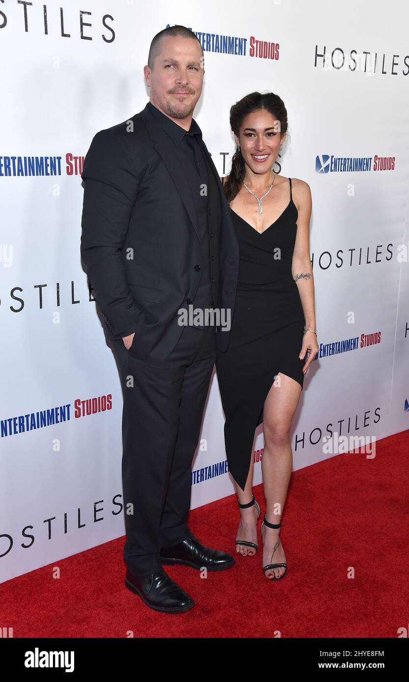 Christian Bale and Q'orianka Kilcher at the premiere of "Hostiles" held