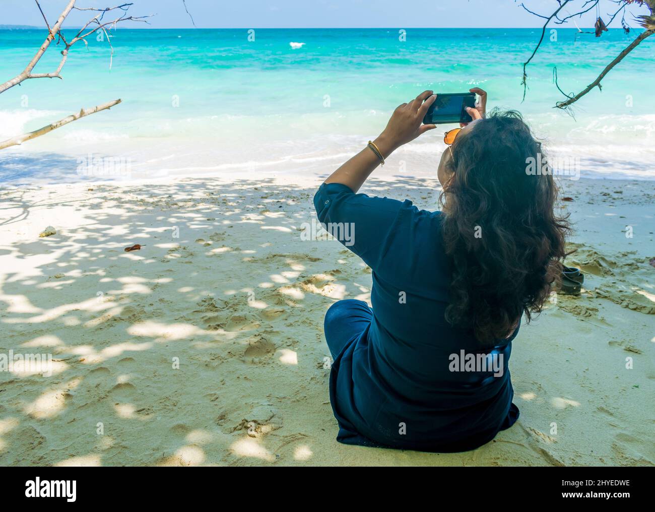 woman on the beach, Kalapathar Beach, Havelock Island, India Stock Photo