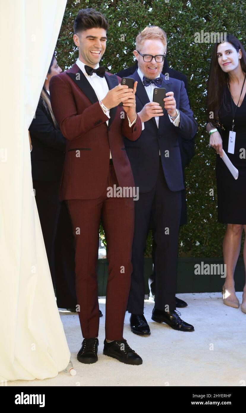 Jesse Tyler Ferguson, Justin Mikita attending the Elton John AIDs foundation Oscar Party held in Beverly Hills, Los Angeles, USA Stock Photo