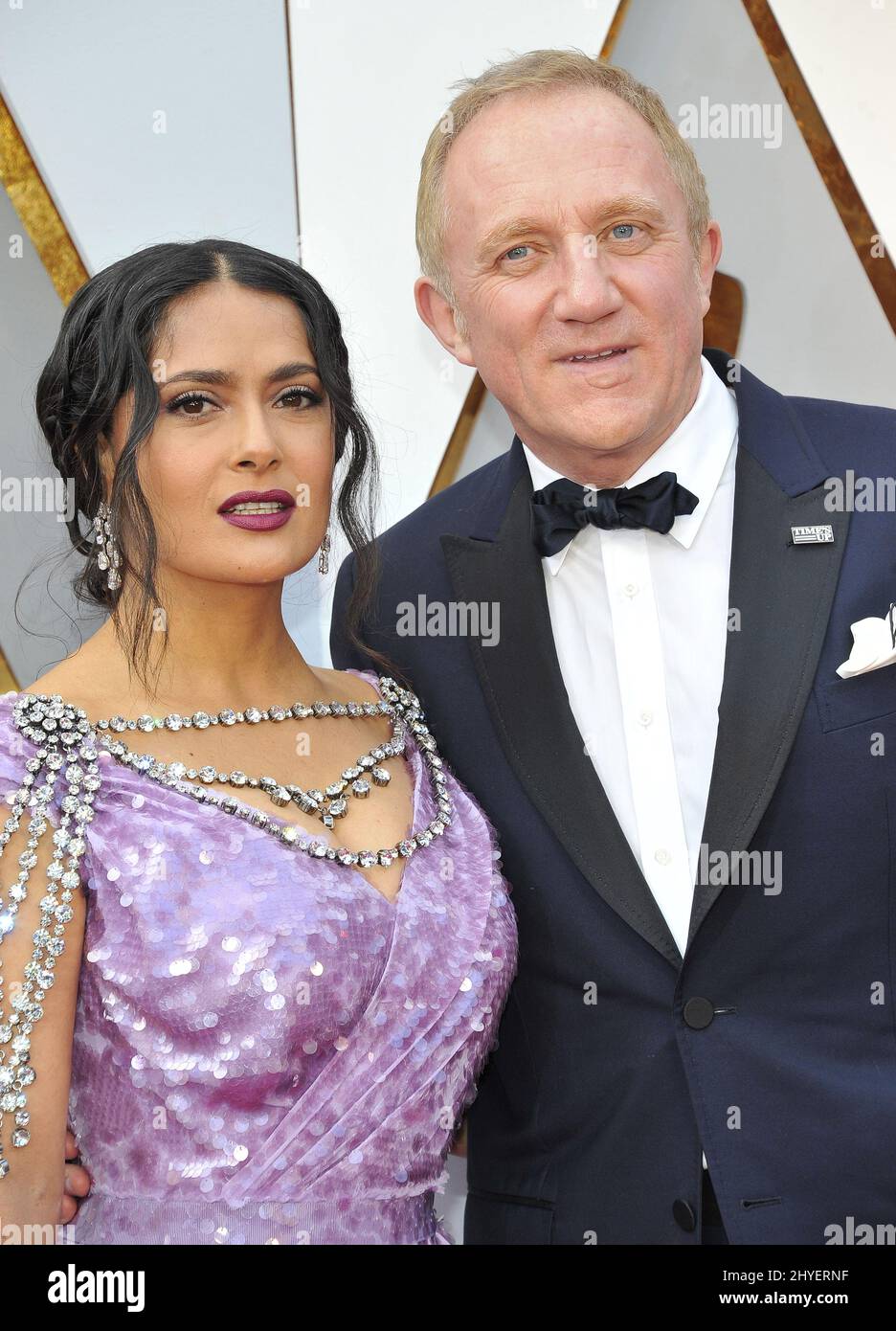Salma Hayek and Francois-Henri Pinault arriving at the 90th Academy Awards in Los Angeles, California Stock Photo
