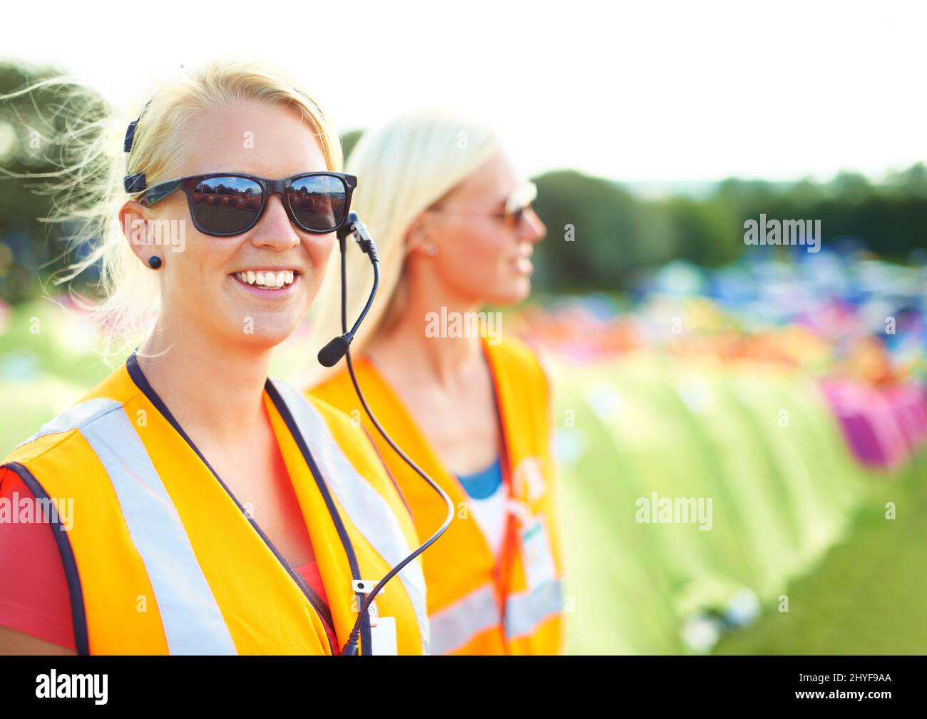 Making sure everything goes smoothly. Two young female security