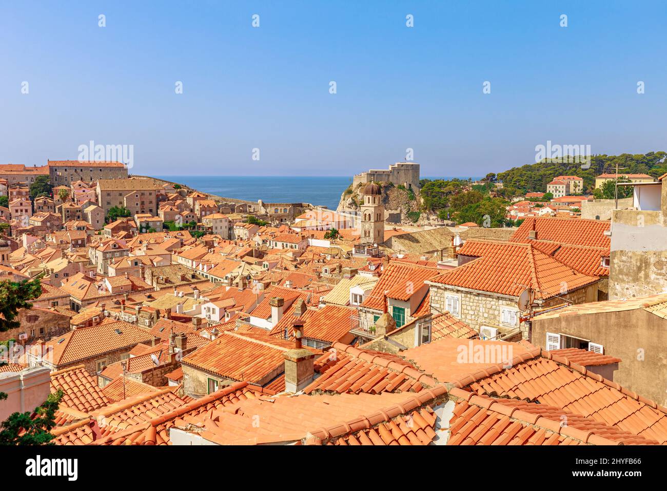 Aerial view on Dubrovnik walls in Croatia. View of Fort Lovrijenac fortress and church Crkva sv. Vlaho Saint Biagio of Dubrovnik UNESCO Venetian town Stock Photo