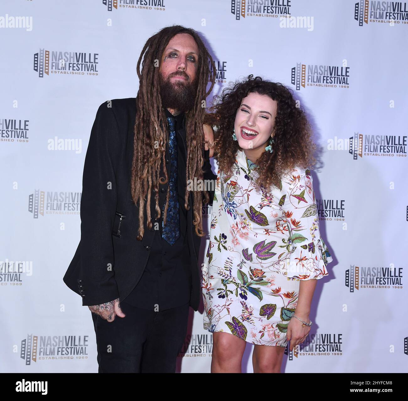 Brian Welch and Jennea Welch of the band Korn attend the screening of 'Loud Krazy Love' during the Nashville Film Festival held at the Regal 27 Hollywood Theatre on May 11, 2018 in Nashville, Tennessee Stock Photo