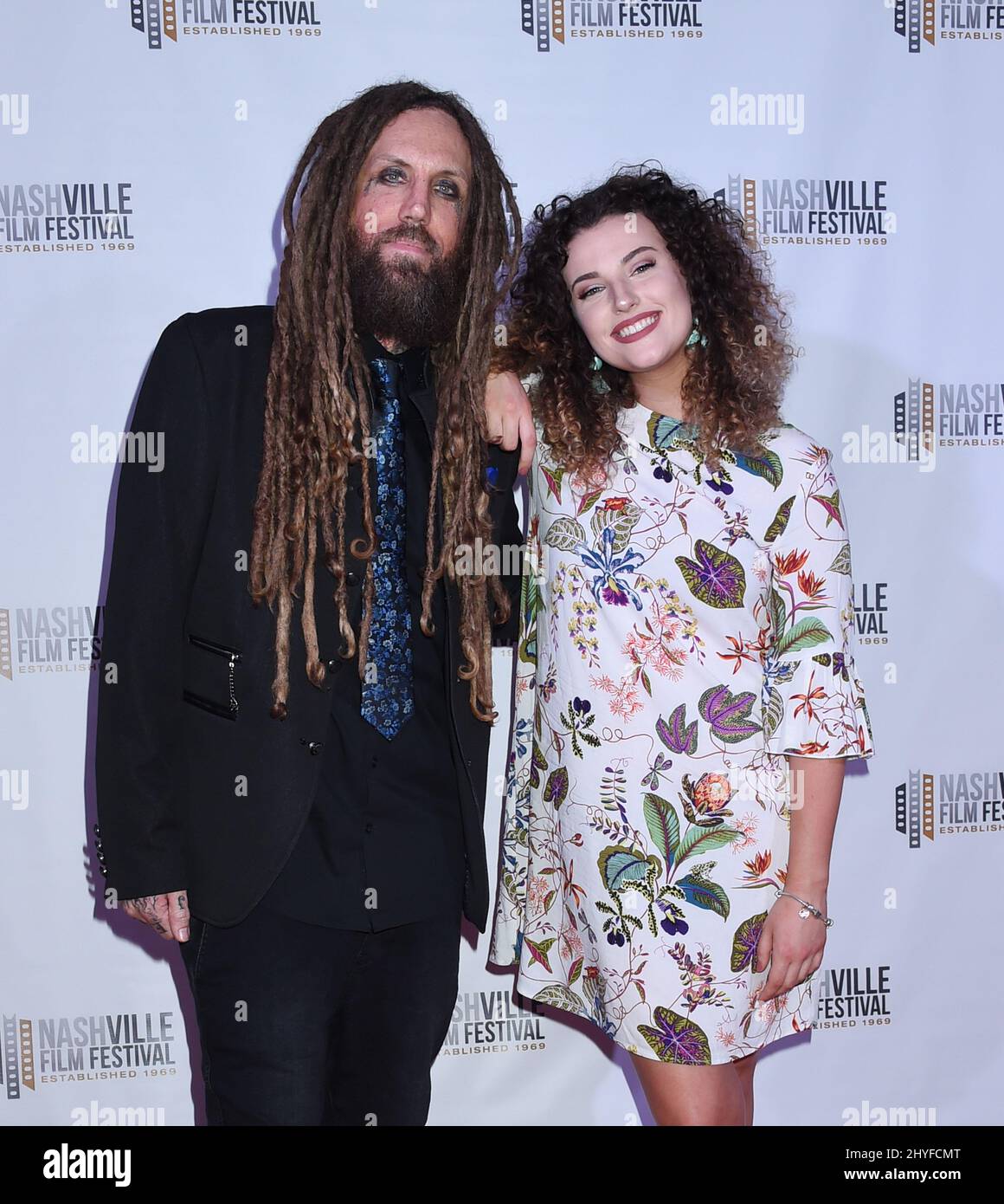 Brian Welch and Jennea Welch of the band Korn attend the screening of