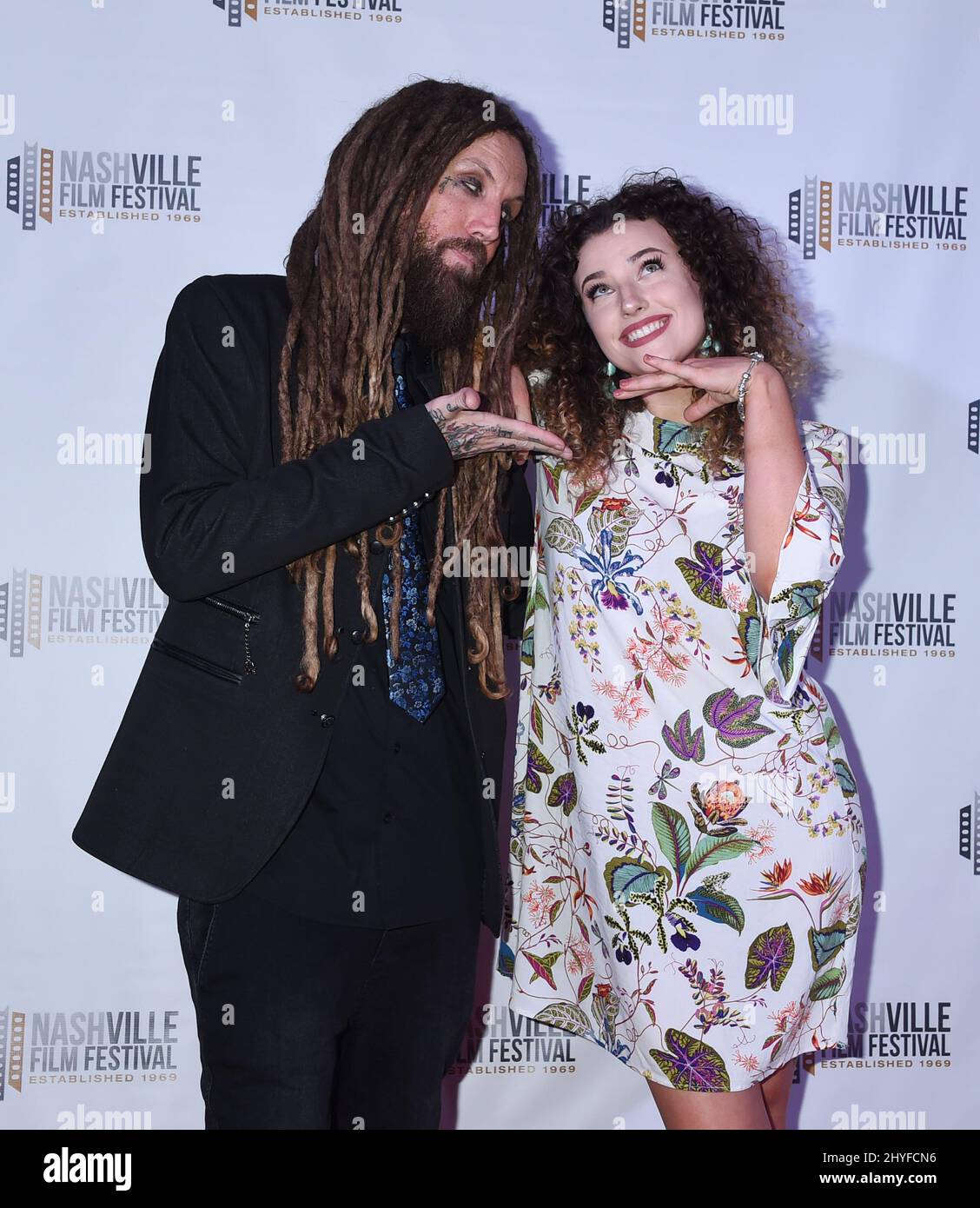 Brian Welch and Jennea Welch of the band Korn attend the screening of