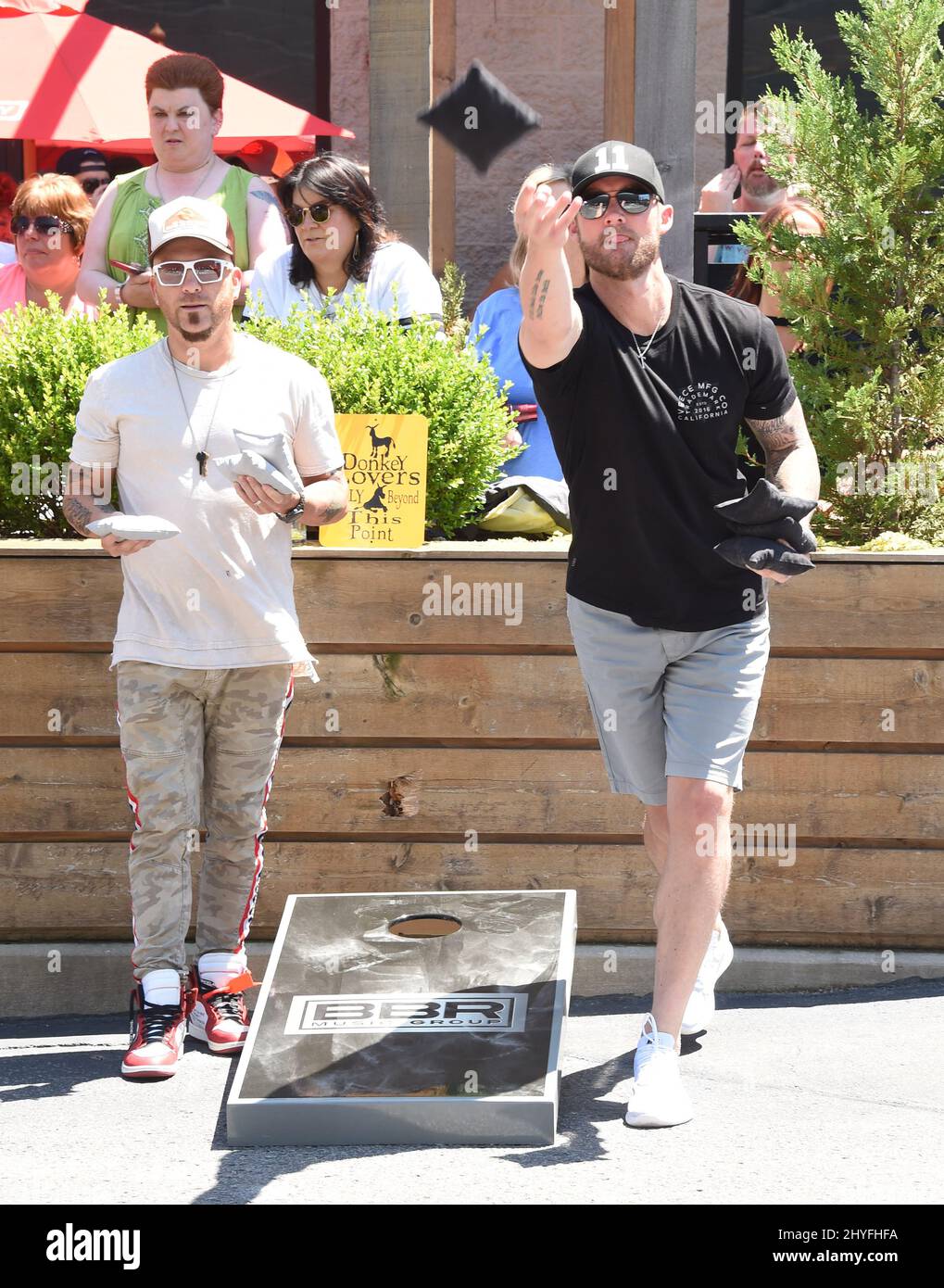 Chris Lucas and Brett Young at the 6th Annual Craig Campbell Celebrity Cornhole Challenge benefitting the non-profit Fight Colorectal Cancer (Fight CRC) held at the City Winery, Nashville on June 5, 2018. Stock Photo