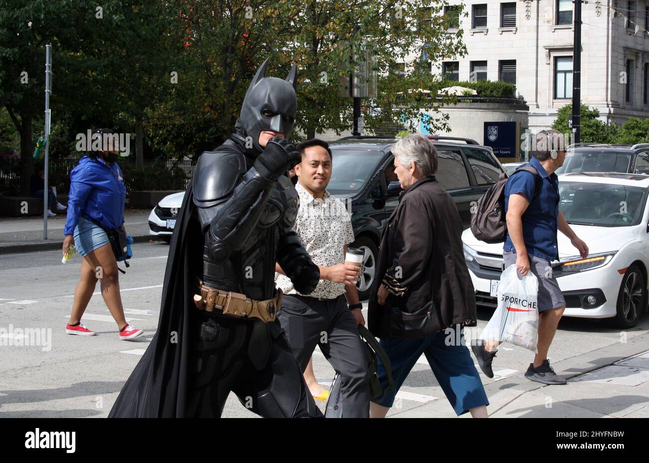 Batman walking in the street of downtown Vancouver, British 