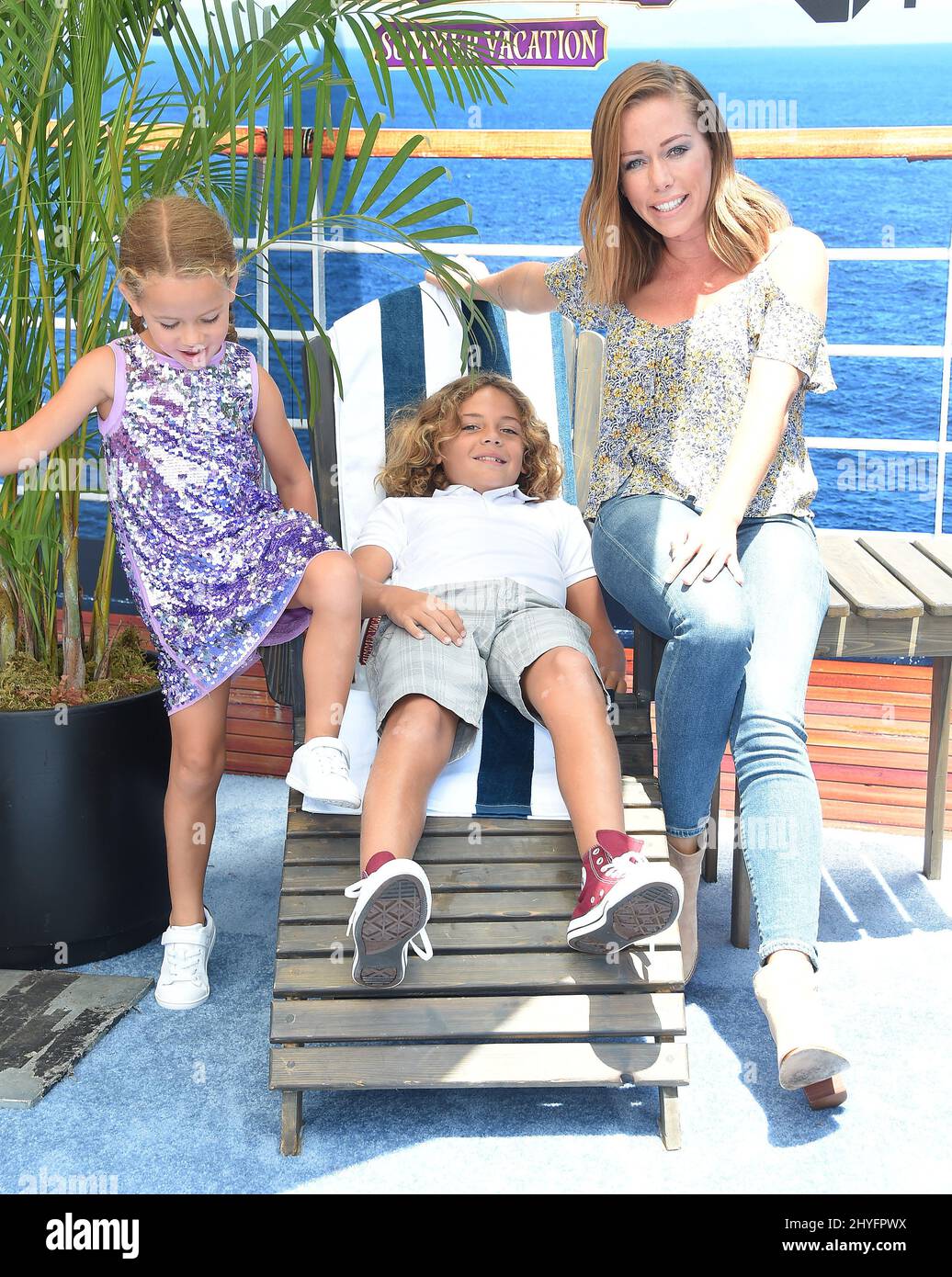 Kendra Wilkinson, Hank Baskett IV and Alijah Baskett arriving to the
