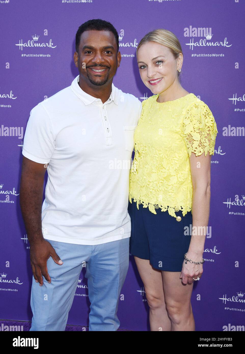 Alfonso ribeiro and angela unkrich attending hallmark s put it into