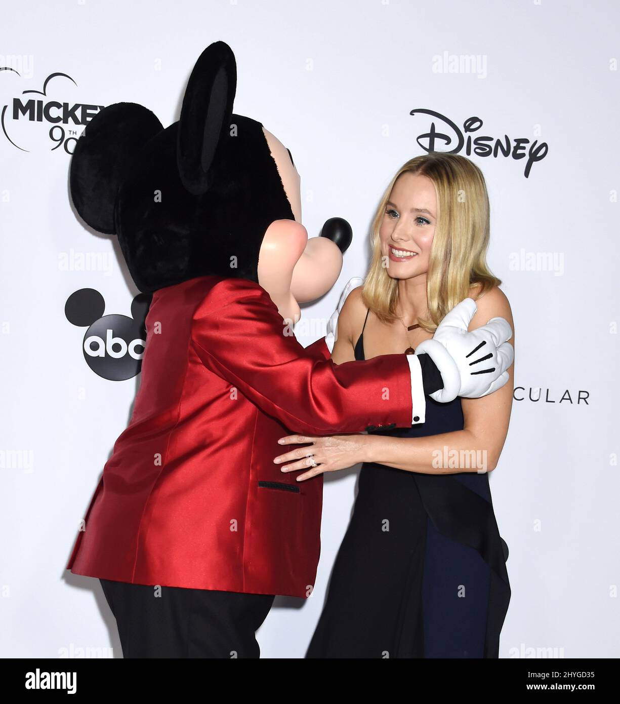 Mickey Mouse and Kristen Bell arrive at Mickey's 90th Spectacular held