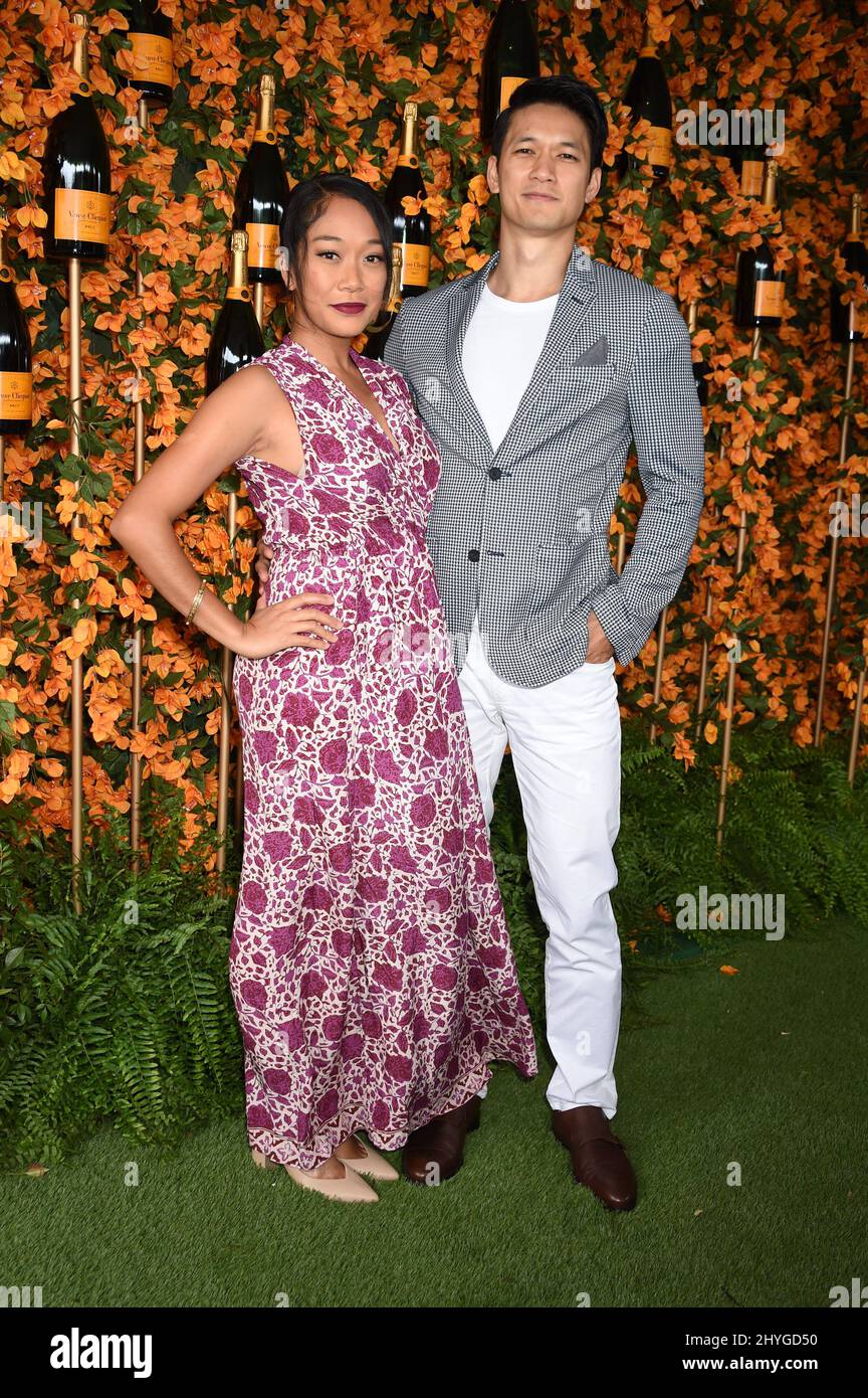 Harry Shum Jr. and Shelby Rabara arrive at the 9th Annual Veuve Clicquot Polo Classic held at Will Rogers State Park on October 6, 2018 in Pacific Palisades, Ca Stock Photo