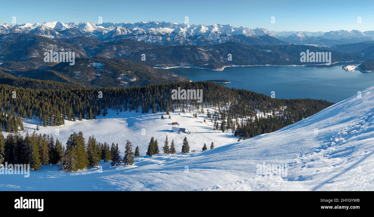View towards lake Walchensee and the Karwendel mountain range. View from Mt. Jochberg near lake Walchensee during winter in the bavarian Alps. Europe Stock Photo