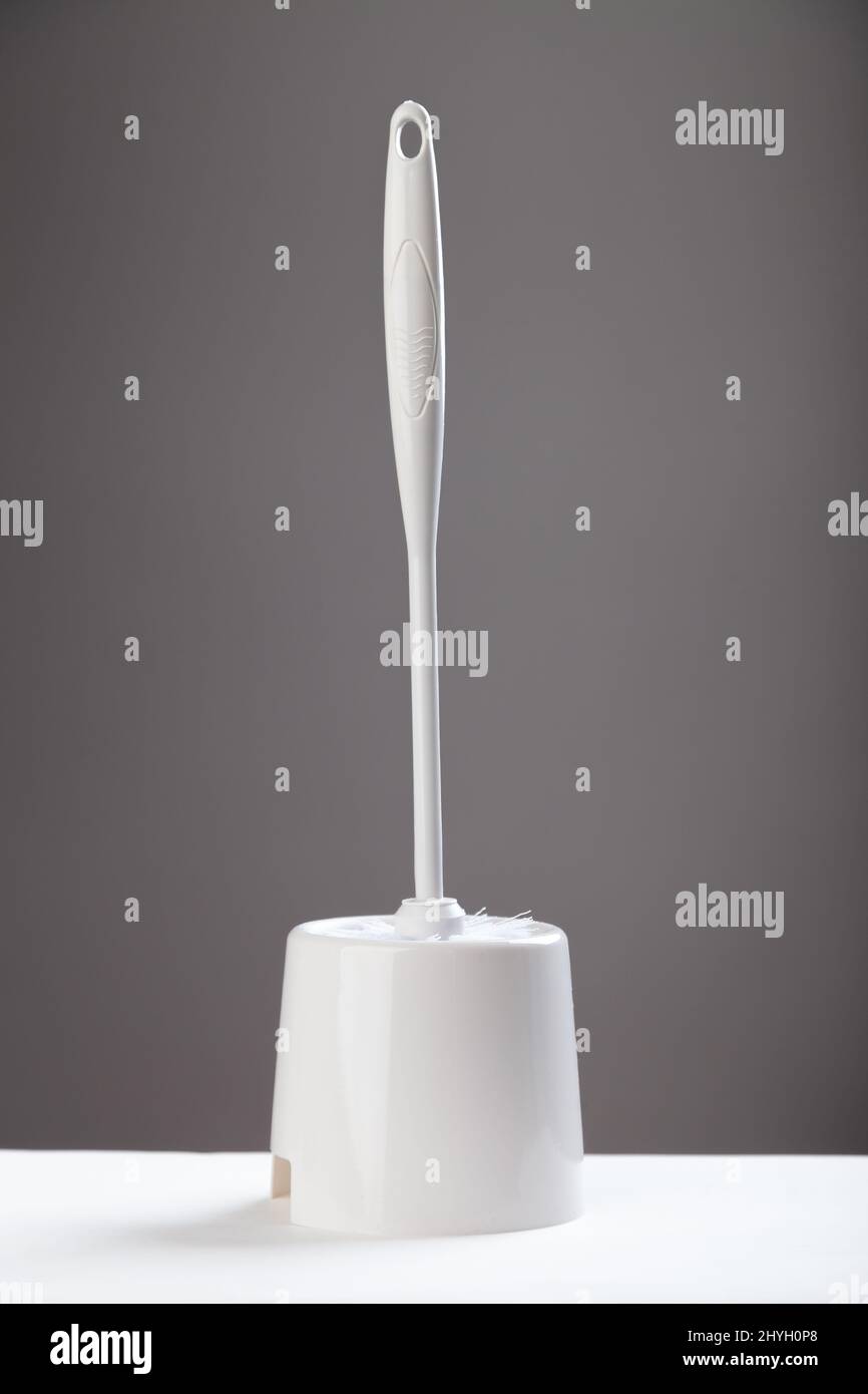 Close up of a white plastic Toilet Brush Stock Photo