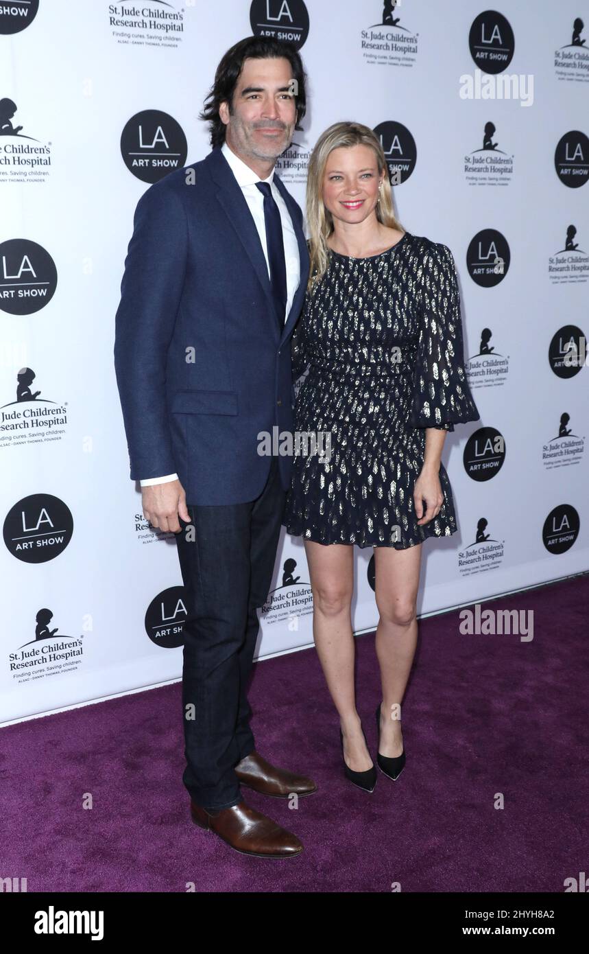 Carter Oosterhouse and Amy Smart attending the 24th Annual LA Art Show