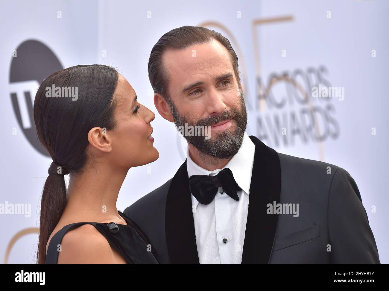 Joseph Fiennes and Maria Dolores Dieguez at the 25th Annual Screen Actors Guild Awards held at the Shrine Auditorium Stock Photo