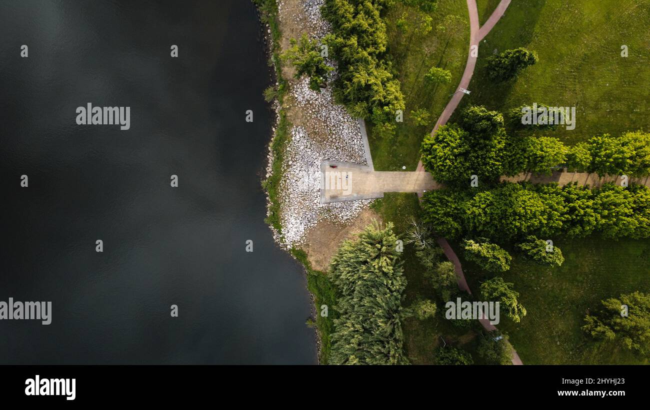 Aerial view of flowing Tejo river in Santarem, Portugal on a sunny day ...