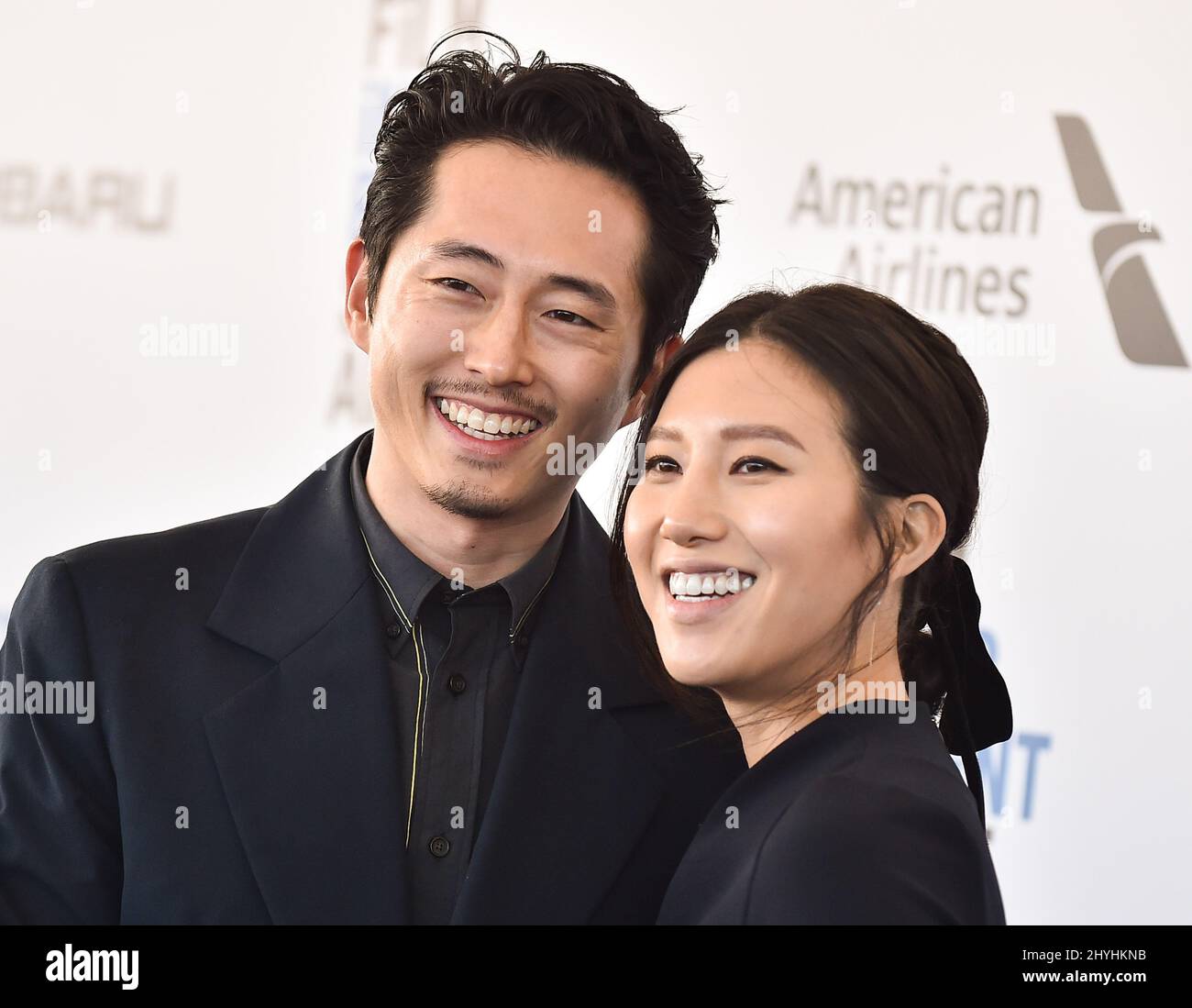 Steven Yeun and Joana Pak at the 2019 Film Independent Spirit Awards held on Santa Monica Beach on February 23, 2019 in Santa Monica, CA. Stock Photo