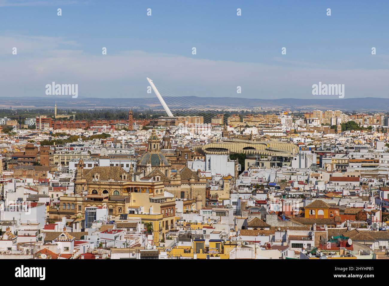 Editorial: SEVILLE, ANDALUSIA, SPAIN, OCTOBER 11, 2021 - Looking over Seville's roofs in the direction of Metropol Parasol seen from the Giralda Stock Photo