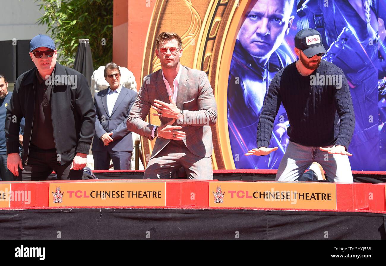 Kevin Feige, Chris Hemsworth and Chris Evans at the handprint ceremony for Marvel Studios' 'Avengers: Endgame' cast held in the TCL Chinese Theatre Stock Photo