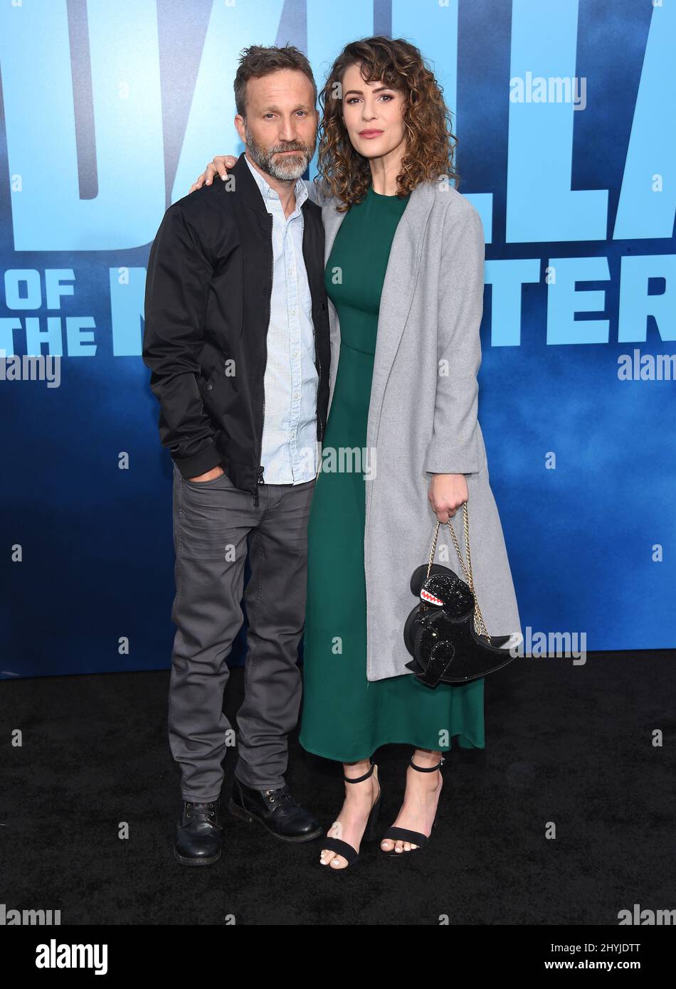 Breckin Meyer and Linsey Godfrey arriving to the 'Godzilla King of the Monsters' Stock Photo